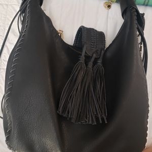 Big buddah large black designer purse.